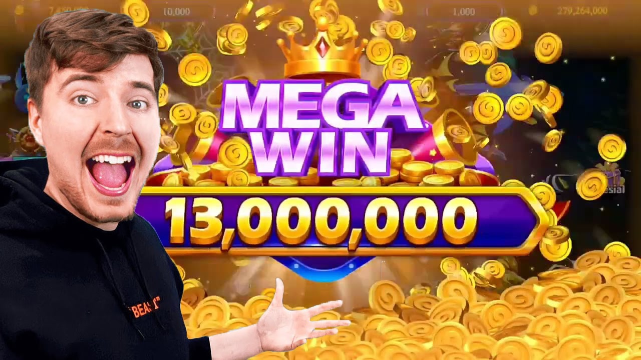 The Mr Beast Game appwith an excited facial expression, wearing a black hoodie, is gesturing towards a vibrant graphic that reads MEGA WIN in bold purple and gold letters. Below the text, 13,000,000 is displayed prominently in gold numbers, surrounded by a cascade of golden coins.